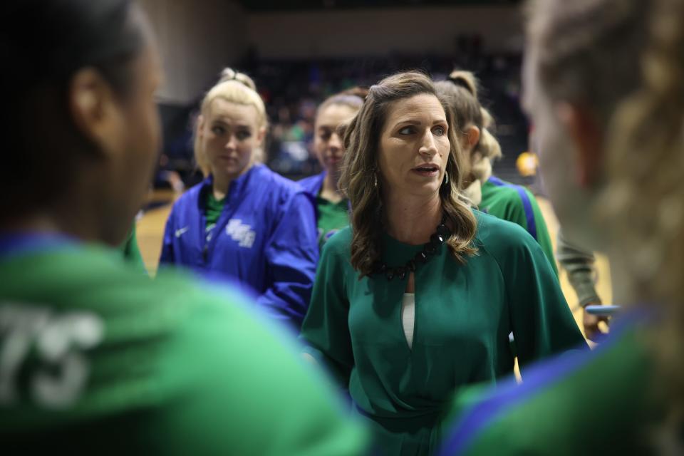 University of West Florida head volleyball coach Melissa Wolter talks to her team during a timeout as UWF faced Embry-Riddle on Friday, Dec. 4, 2021 in a NCAA South Regional semifinal from the UWF Field House.