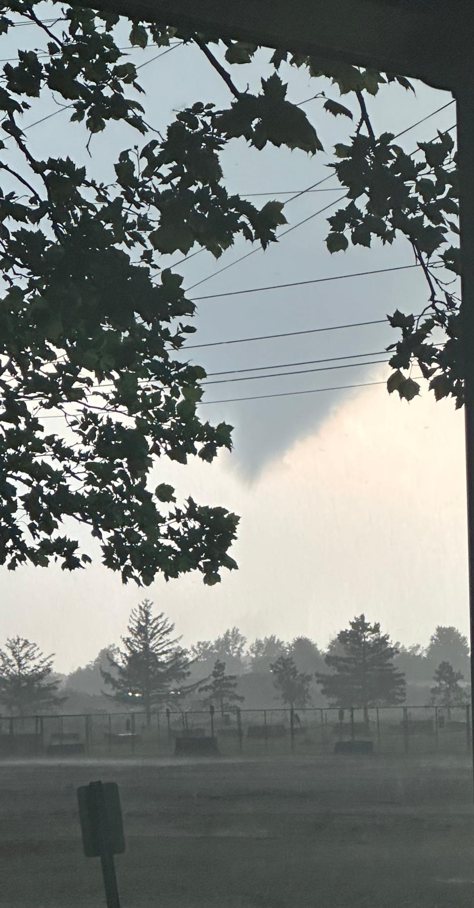 This funnel cloud was photographed shortly before touching down near the Ottawa County Fairgrounds on Thursday night [June 15].