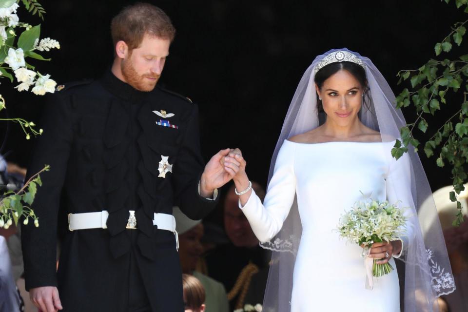 Meghan Markle and Prince Harry leave St George's Chapel at Windsor Castle (REUTERS)