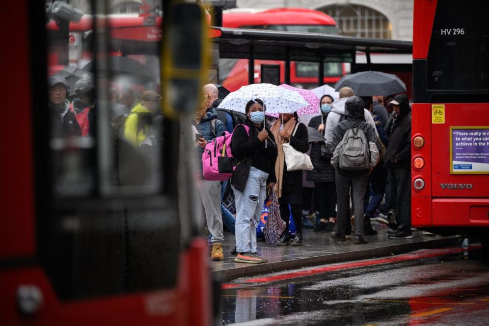 Commuters queue to board packed buses at Victoria Station as a tube strike impacts the Monday morning rush hour (Getty Images)