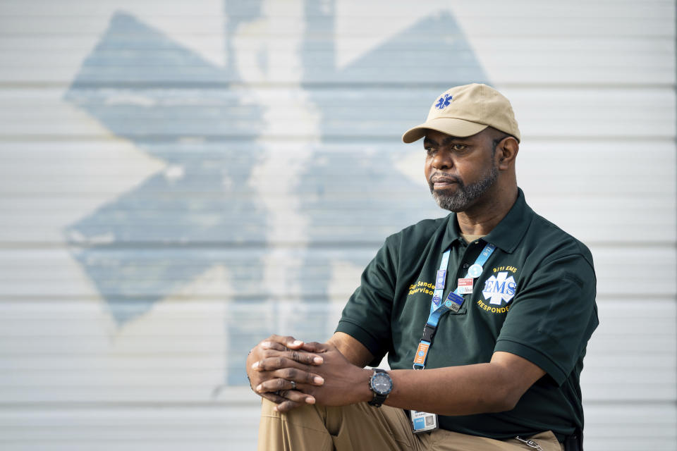 Guy Sanders poses for a portrait, Friday, Aug. 20, 2021, in Branchville, S.C. Sanders, originally from Brooklyn, N.Y., was an EMT who responded to the terrorist attacks on Sept. 11, 2001 and was on the scene when 7 World Trade Center collapsed. Sanders went to funeral after funeral for EMTs, firefighters and police to show appreciation for their sacrifice. (AP Photo/Sean Rayford)