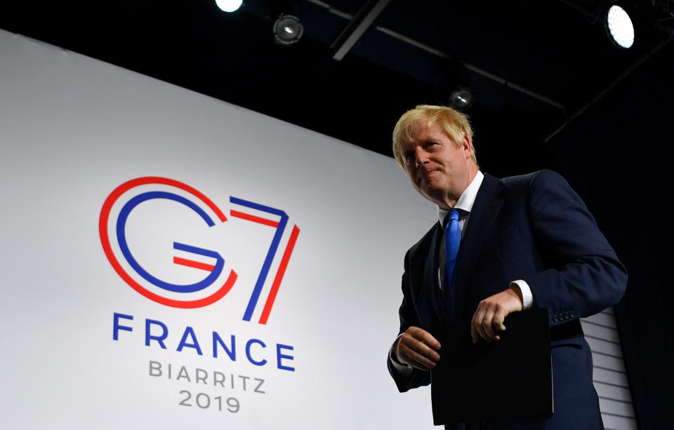 Britain's Prime Minister Boris Johnson leaves a news conference at the end of the G7 summit in Biarritz, France, August 26, 2019. REUTERS/Dylan Martinez