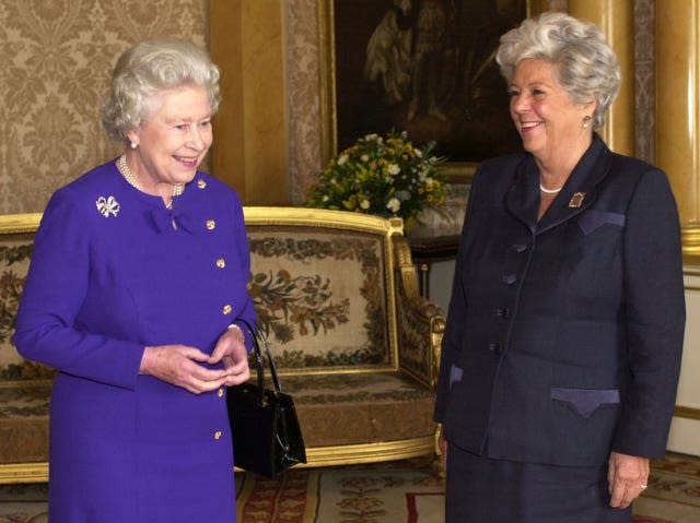 Queen Elizabeth sharing a joke with Betty Boothroyd 