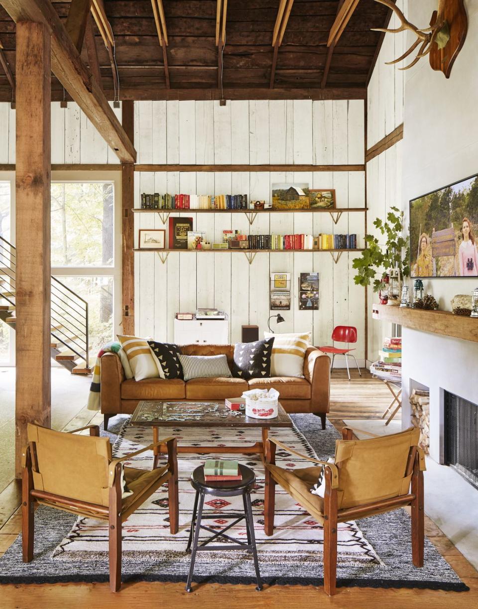 rustic living room with modern leather furniture