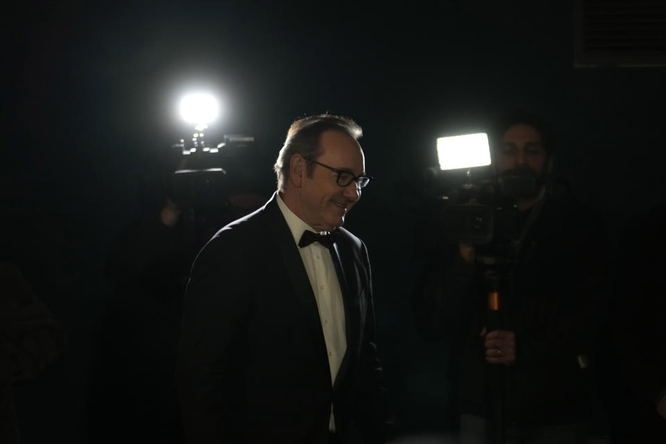 Actor Kevin Spacey smiles as he arrives at the Cinema Massimo in Turin, Italy, Monday, Jan. 16, 2023. Kevin Spacey was in the northern Italian city of Turin on Monday to receive the lifetime achievement award, teach a master class and introduce a screening of the 1999 film "American Beauty." (AP Photo/Luca Bruno)