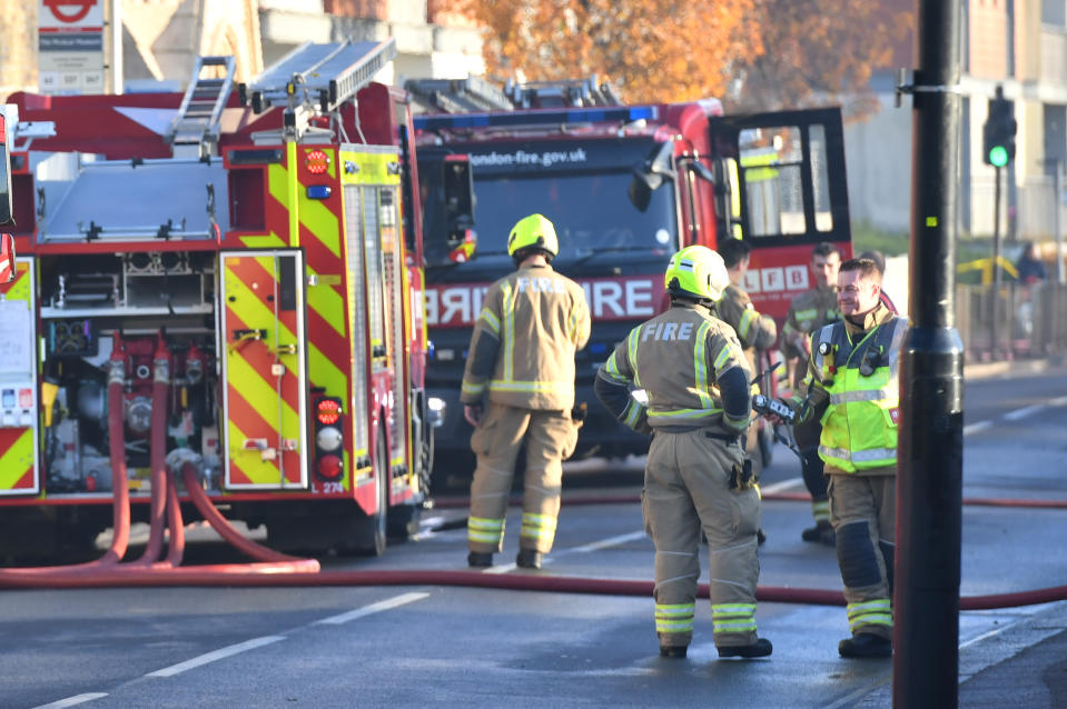 Firefighters at the scene of a blaze at a Travelodge in west London. (Photo by Dominic Lipinski/PA Images via Getty Images)