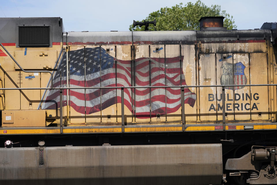 FILE - An American flag is emblazoned on this Union Pacific Railroad locomotive sitting in the Jackson, Miss., terminal rail yard, Wednesday, April 20, 2022. Union Pacific reports earnings on Thursday, Oct. 19, 2023. (AP Photo/Rogelio V. Solis, File)