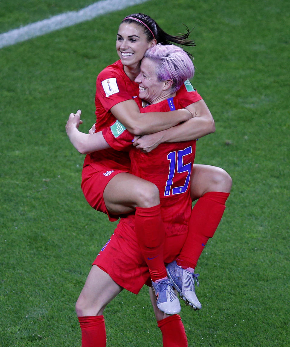 United States' Megan Rapinoe, right, congratulates teammate Alex Morgan after scoring her fifth goal during the Women's World Cup Group F soccer match between the United States and Thailand at the Stade Auguste-Delaune in Reims, France, Tuesday, June 11, 2019. (AP Photo/Francois Mori)