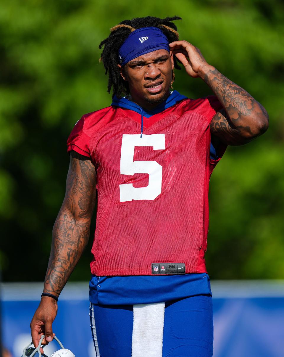 Indianapolis Colts quarterback Anthony Richardson (5) fixes his head band Saturday, July 29, 2023, during Colts Training Back Together Weekend at Grand Park in Westfield.