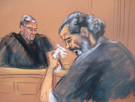 Egyptian Adel Abdul Bary, 54, wipes away tears while facing U.S. District Judge Lewis Kaplan in a Manhattan court in New York on September 19, 2014, in this courtroom sketch. REUTERS/Jane Rosenberg