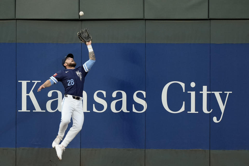 Kansas City Royals center fielder Kyle Isbel catches a fly ball for the out on Baltimore Orioles' Ryan O'Hearn during the fourth inning of a baseball game Friday, April 19, 2024, in Kansas City, Mo. (AP Photo/Charlie Riedel)