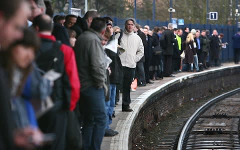 Passengers were left waiting when many trains were cancelled last year - Credit:  PA/Gareth Fuller