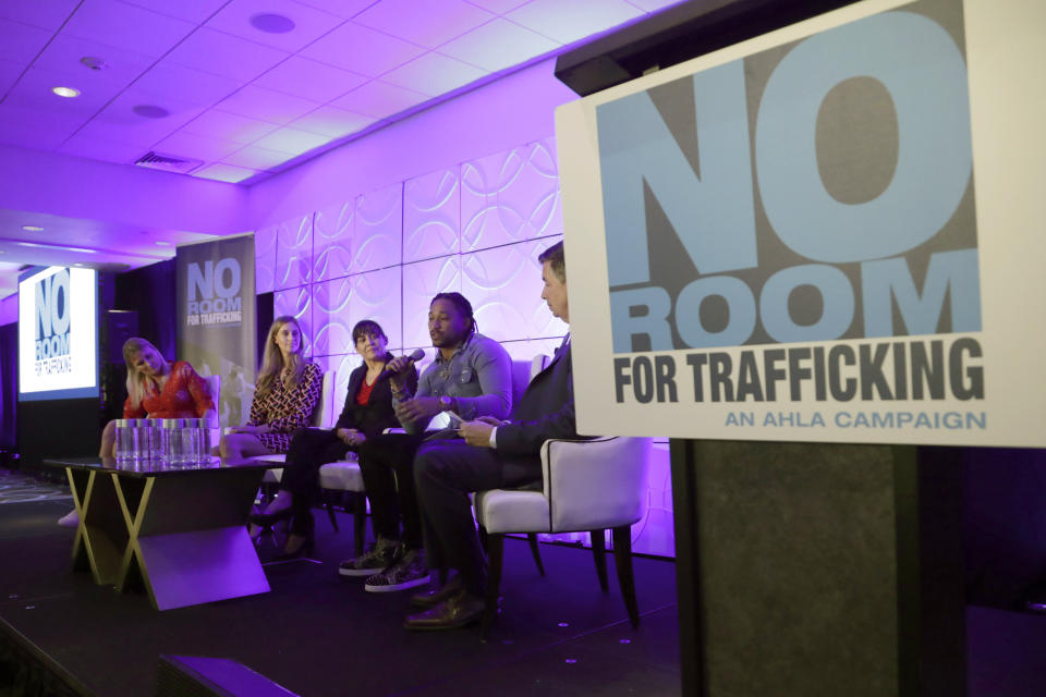 Miami Dolphins wide receiver Albert Wilson, second from right, speaks during a meeting between law enforcement officials and hotel groups to announce a campaign to prevent human trafficking surrounding next month's Super Bowl NFL football game in the Miami area, Thursday, Jan. 9, 2020, in Miami Beach, Fla. (AP Photo/Lynne Sladky)