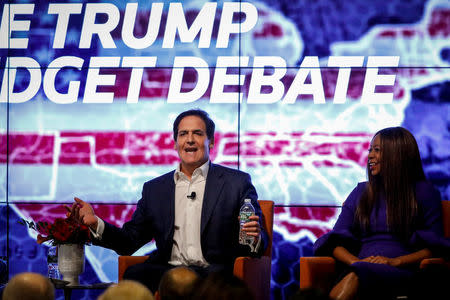 Businessman Mark Cuban and economist and author Dambisa Moyo participate in a Reuters Newsmaker panel on 'The Trump Budget Debate' in New York, U.S., November 15, 2017. REUTERS/Brendan McDermid