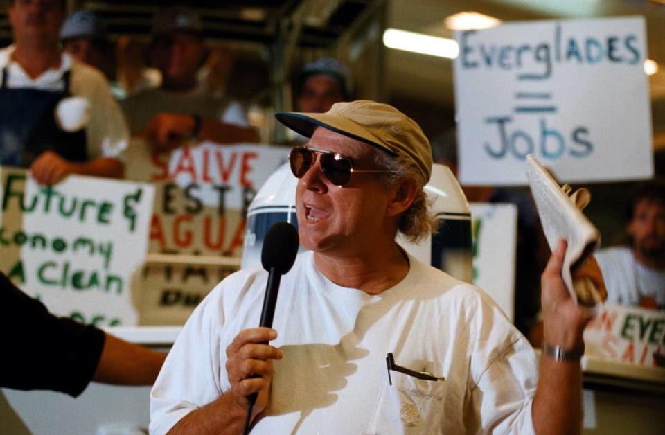 In this file photo from Oct. 30, 1996, Jimmy Buffett talks about his efforts to help save the Everglades at a rally in Dania Beach, Florida.