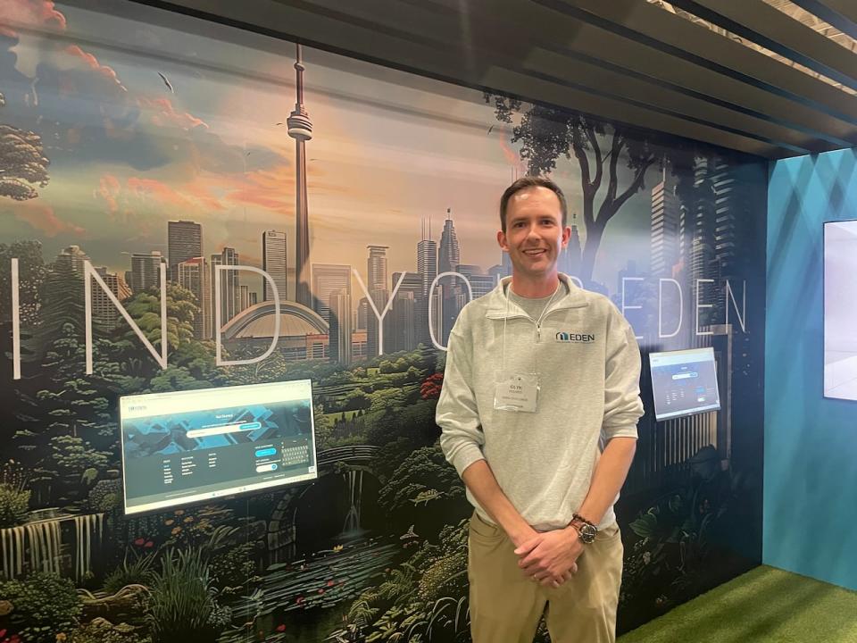 Glyn Holmes co-founded a business that assesses properties to see if they're eligible for garden suites, and then connects homeowners with builders. He was working with Eden Dwellings at the home show Friday.