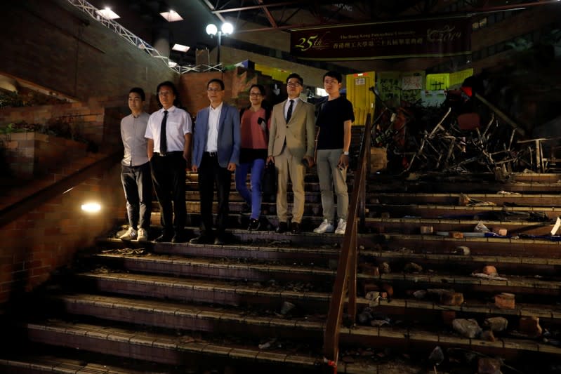 Pro-democratic lawmakers are pictured after meeting with protesters at the Polytechnic University (PolyU) in Hong Kong