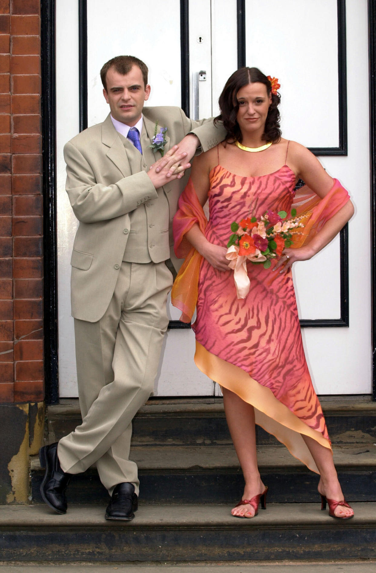 Coronation Street characters Steve McDonald, played by Simon Gregson and Karen Phillips, played by Suranne Jones after marrying at Salford Registry Office in Manchester.   (Photo by Haydn West - PA Images/PA Images via Getty Images)