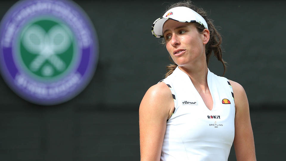 Johanna Konta reacts during her loss at Wimbledon. (Photo by Rob Newell - CameraSport via Getty Images)