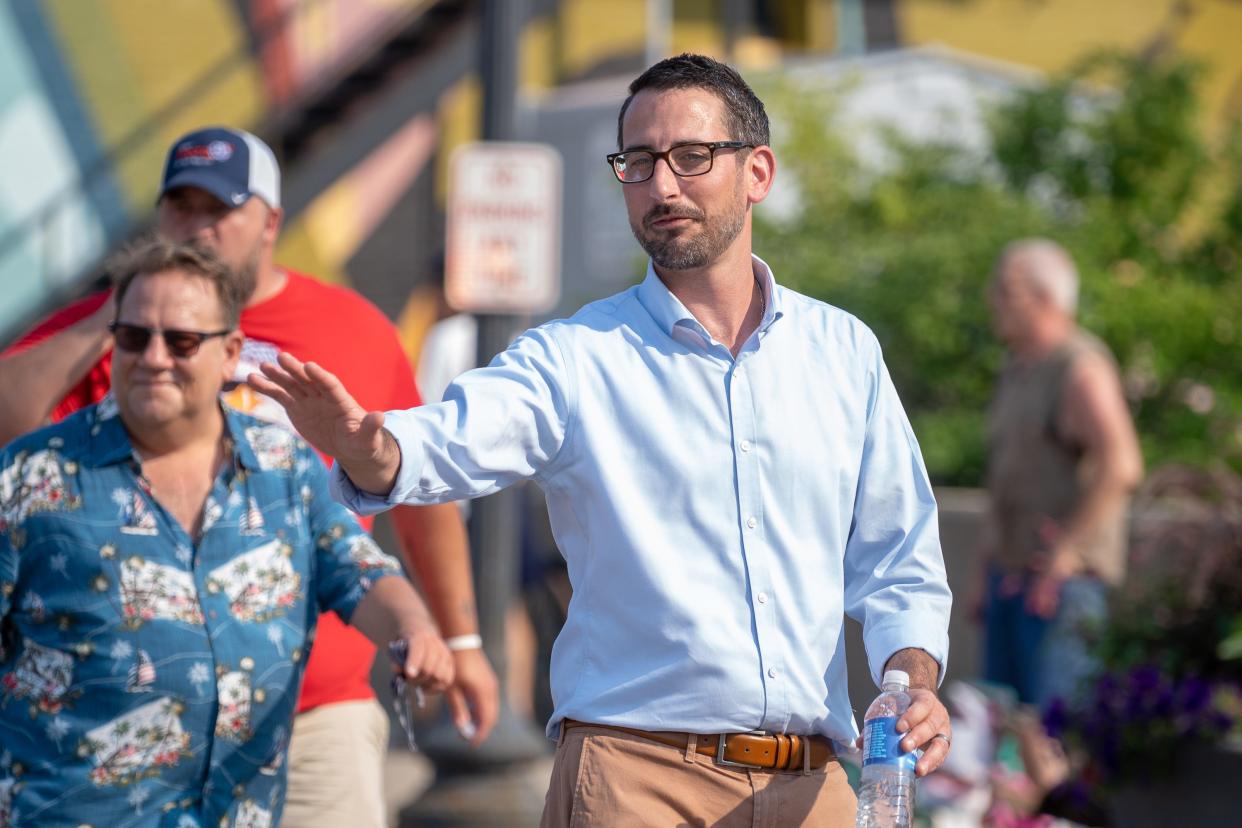 Following the deadly shooting at a Fourth of July parade Monday morning in the Chicago suburb of Highland Park, Rockford Mayor Tom McNamara, seen here walking in Rockford's parade on July 4, 2021, said the city's police department is prepared to provide whatever security is necessary for the city's celebration, scheduled for Monday evening in downtown Rockford.