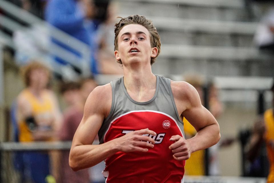 Fishers' Tyler Tarter competes in the 300 meter hurdles during the IHSAA boys track and field sectionals on Thursday, May 19, 2022, at Carmel High School in Carmel Ind. 