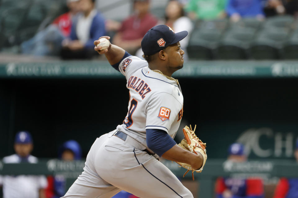 Houston Astros starting pitcher Framber Valdez throws against the Texas Rangers during the first inning of a baseball game Monday, April 25, 2022, in Arlington, Texas. (AP Photo/Michael Ainsworth)
