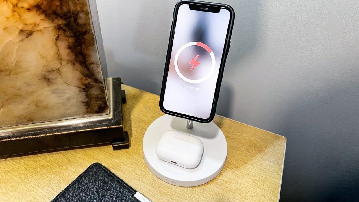 apple charging station with airpods phone and watch