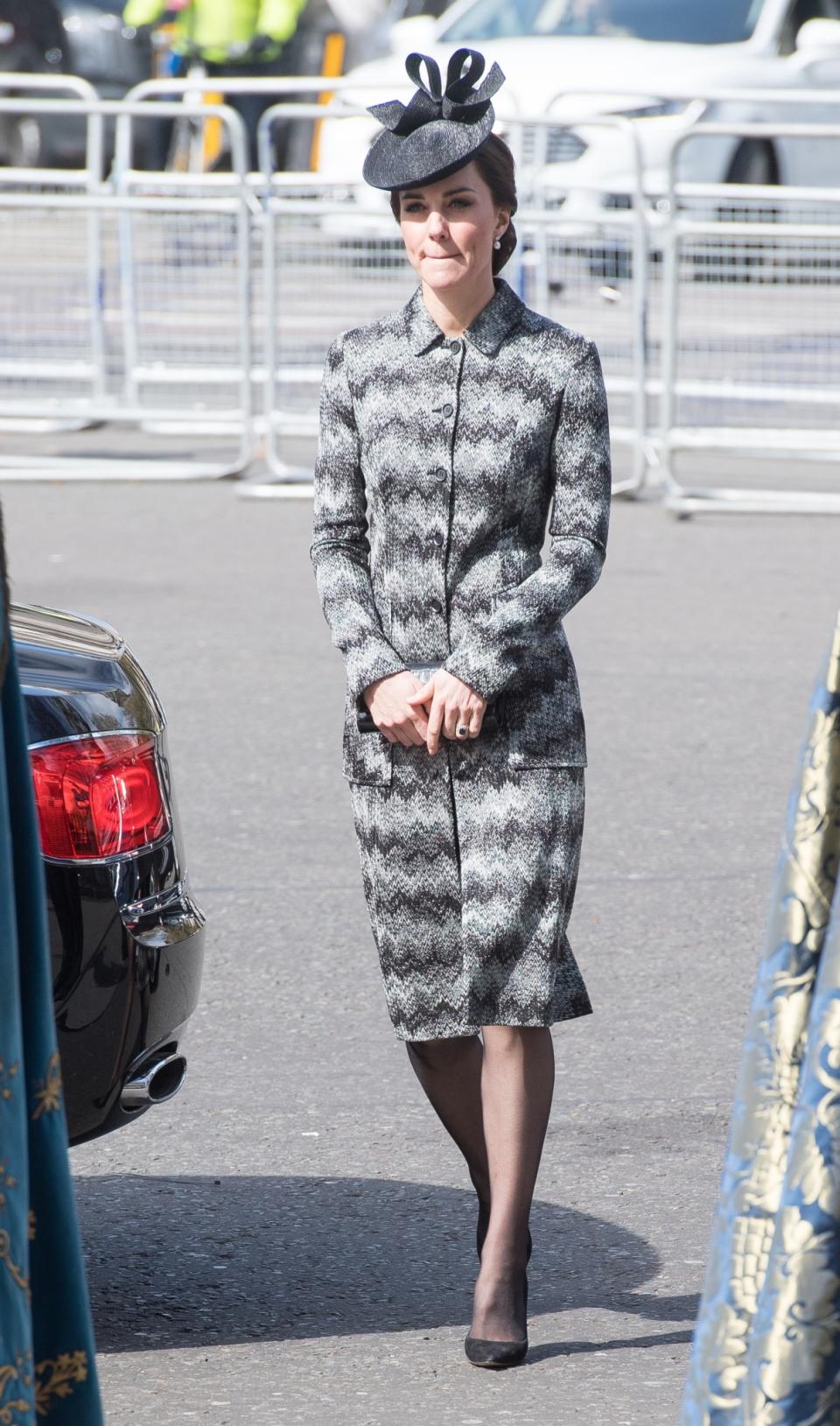 <p>The Duchess chose a suitably sombre look for a memorial service remembering the victims of the Westminster attack. She wore a zig-zag printed coat by Missoni (costing £2900) with a bow-topped black hat. A black clutch and heeled pumps added to the dark ensemble.<br><i>[Photo: PA]</i> </p>