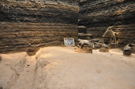 A wide road topped with crushed white limestone, called a sacbe, was found buried under volcanic ash in the Ceren village.