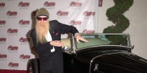 <p><a rel="nofollow noopener" href="http://www.rollingstone.com/music/lists/100-greatest-guitarists-20111123/billy-gibbons-20111122" target="_blank" data-ylk="slk:Rolling Stone currently lists;elm:context_link;itc:0;sec:content-canvas" class="link ">Rolling Stone currently lists</a> Billy Gibbons as number 32 on its list of the 100 best guitarists of all time, and for good reason. The man is incredibly talented. Legend has it, Jimi Hendrix was so impressed with Gibbons' skill, he gave him a pink Stratocaster as a gift. As great as his music is, if you're a car enthusiast, you'll also be impressed with his love of cars. He's collected hot rods and custom cars for years and <a rel="nofollow noopener" href="http://www.amazon.com/Billy-Gibbons-Rock-Roll-Gearhead/dp/0760340307" target="_blank" data-ylk="slk:even has a book;elm:context_link;itc:0;sec:content-canvas" class="link ">even has a book</a> about his car and guitar collections.</p>