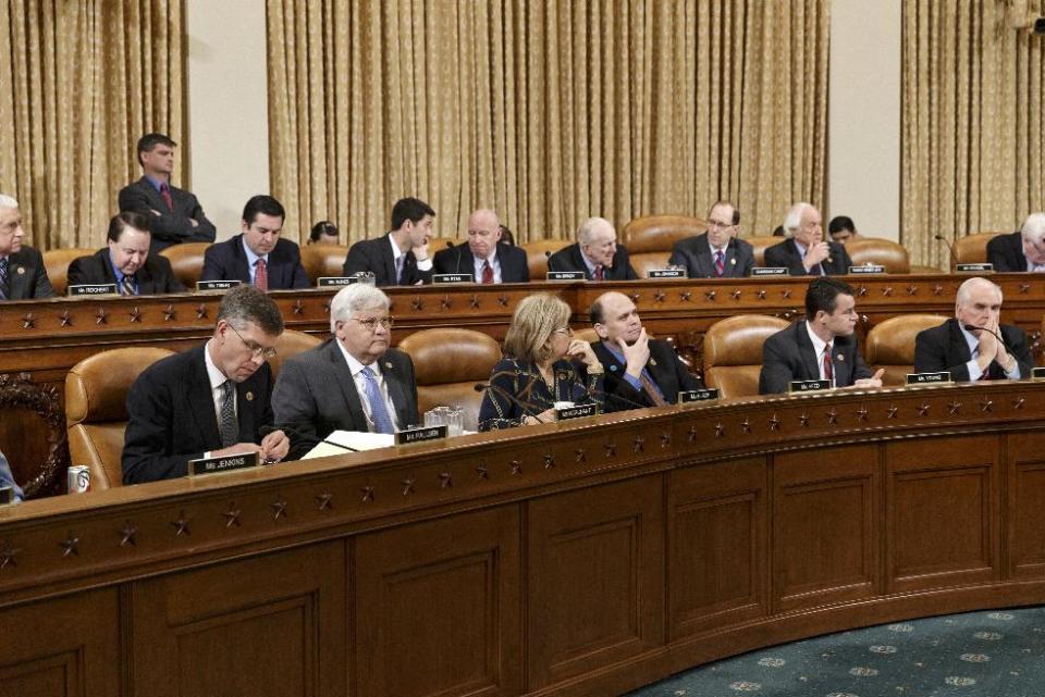 The House Ways and Means Committee debates on Capitol Hill in Washington, Wednesday, April 9, 2014, whether IRS official Lois Lerner’s refusal to testify to Congress deserves criminal prosecution. Lerner, former head of the Internal Revenue Service Exempt Organizations Division, invoked her Fifth Amendment rights and refused to answer questions when twice called before the House Oversight and Government Reform Committee during its investigation of whether the federal tax agency improperly targeted conservative nonprofit political groups for extra scrutiny. Ways and Means wants the Justice Department to open a criminal probe against Lerner. (AP Photo/J. Scott Applewhite)