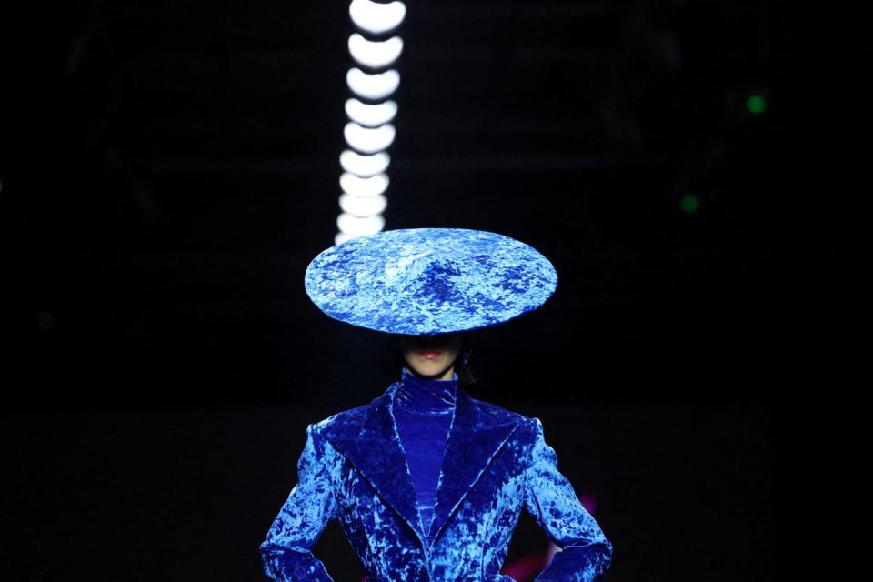 <p>A model presents a creation by designer Robert Wun during the Paris Fashion show</p> (REUTERS)