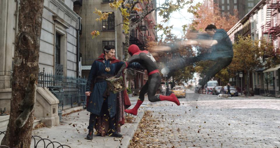 Doctor Strange (Benedict Cumberbatch, left) and Peter Parker (Tom Holland) disagree on how to best fix a magical spell gone awry in "Spider-Man: No Way Home."
