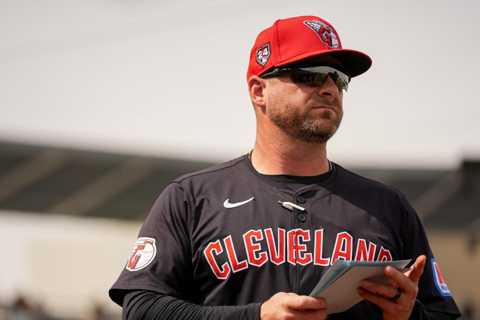 Cleveland Guardians manager Stephen Vogt stands on the field before a spring training baseball game against the Seattle Mariners, Sunday, Feb. 25, 2024, in Peoria, Ariz. (AP Photo/Lindsey Wasson)