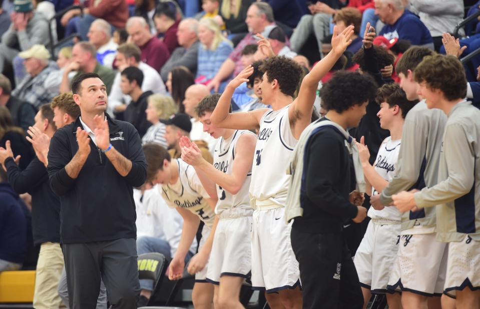 West York coach Garrett Bull looks up at the scoreboard late in the fourth quarter against Dallastown Friday. West York beat Dallastown, 35-29, in the YAIAA boys' basketball quarterfinals at Red Lion High School, Friday, Feb. 11, 2023.