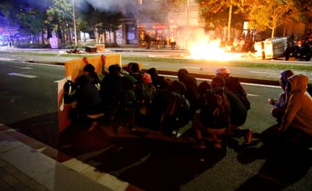 Separatists protest after a verdict in a trial over a banned Catalonia's independence referendum in Barcelona