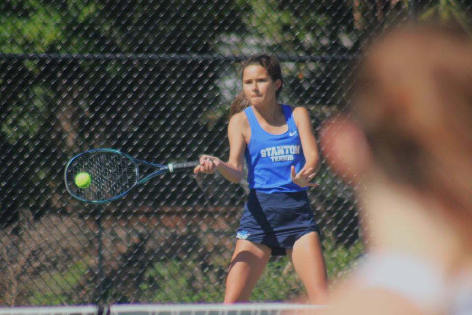 Stanton's Emma Ferguson hits a return in the Gateway Conference tennis championships against Fletcher.