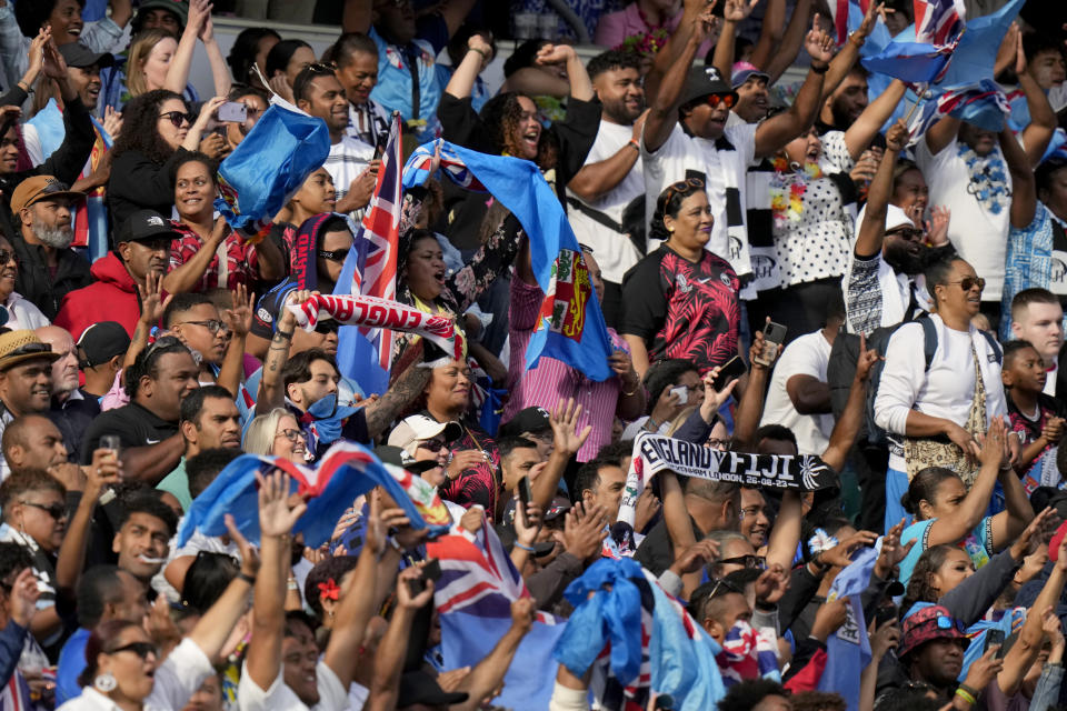 Fiji's fans celebrate at the rugby union international match between England and Fiji at Twickenham stadium in London, Saturday, Aug. 26, 2023. Fiji beat England by 22-30. (AP Photo/Alastair Grant)