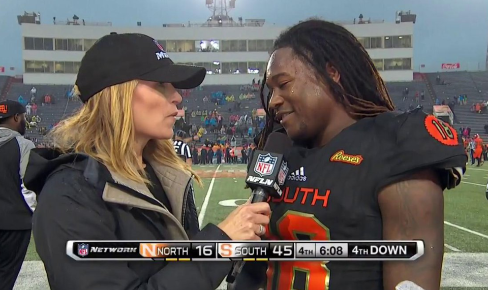 NFL Network sideline reporter Alex Flanagan interviews UCF’s Shaquem Griffin while he’s supposed to be on the field on punt team duty. (Getty)