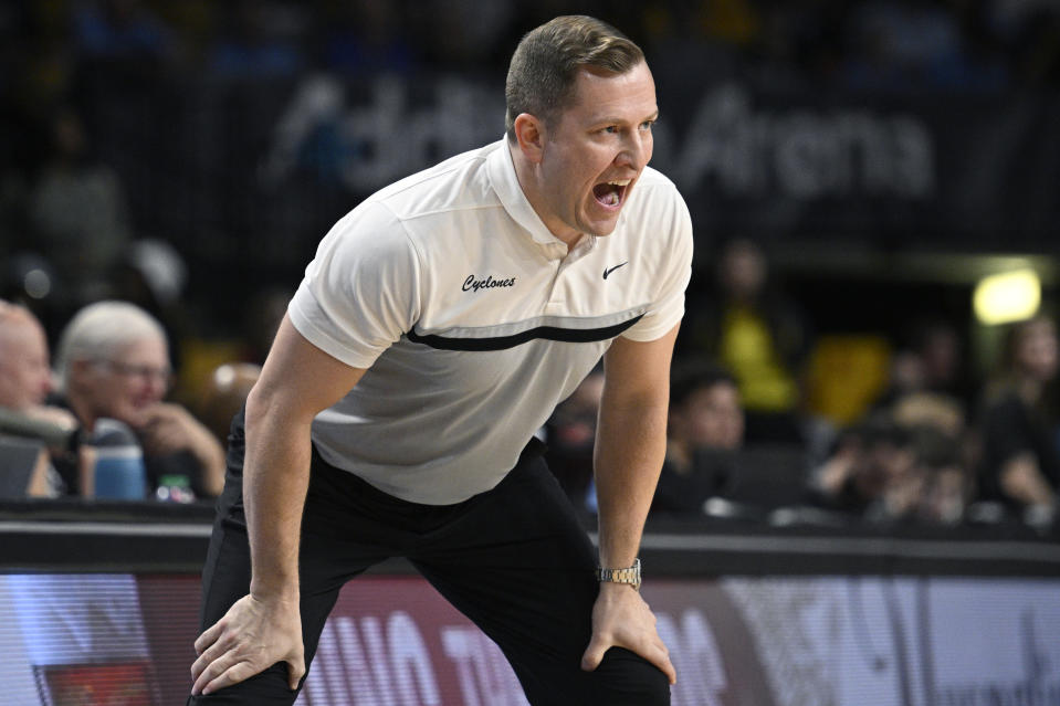 Iowa State head coach T. J. Otzelberger calls out instructions during the first half of an NCAA college basketball game against Central Florida, Saturday, March 2, 2024, in Orlando, Fla. (AP Photo/Phelan M. Ebenhack)