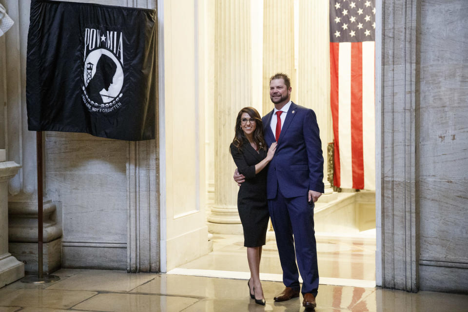 Representative-elect Lauren Boebert, a Republican from Colorado, left, stands for a photograph with her husband Jayson Boebert at the U.S. Capitol in Washington, D.C., U.S., on Sunday, Jan. 3, 2021. The 117th Congress is set to begin with the election of the speaker of the House and administration of the oath of office for lawmakers in both chambers. / Credit: Ting Shen/Bloomberg via Getty Images