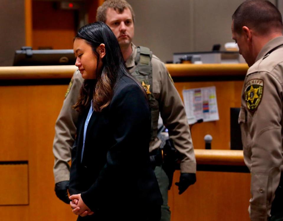 Jennifer Duong, the driver in a one-car accident at the intersection of George Washington Way and Jadwin Avenue on Feb. 27, 2022 that killed her passengers Andres Morfin, 20, and Lianna Salazar, 19, and Daniel Antonio Trejo, 19, is remanded to the Benton County Jail following her sentecing in Benton County Superior Court in Kennewick. Duong pleaded guilty and was sentenced to 78 months in prison.