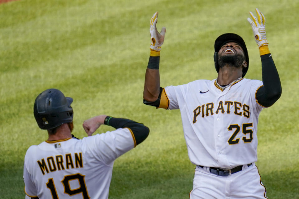 Pittsburgh Pirates' Gregory Polanco, right, celebrates with Colin Moran (19) after driving Moran in with a two-run home run against the Milwaukee Brewers in the fourth inning of a baseball game, Saturday, Aug. 22, 2020, in Pittsburgh. (AP Photo/Keith Srakocic)