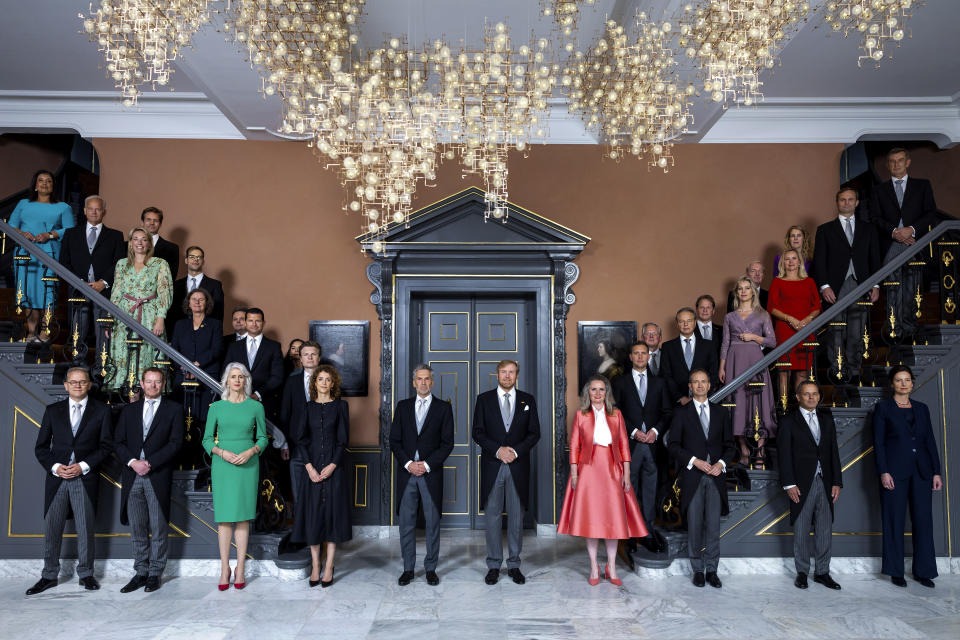 Dutch King Willem-Alexander, center right, Prime Minister Dick Schoof, center left, ministers and deputy ministers of the new Dutch government pose for a group picture at royal palace Huis ten Bosch in The Hague, Netherlands, Tuesday, July 2, 2024. (Remko de Waal/Pool Photo via AP)