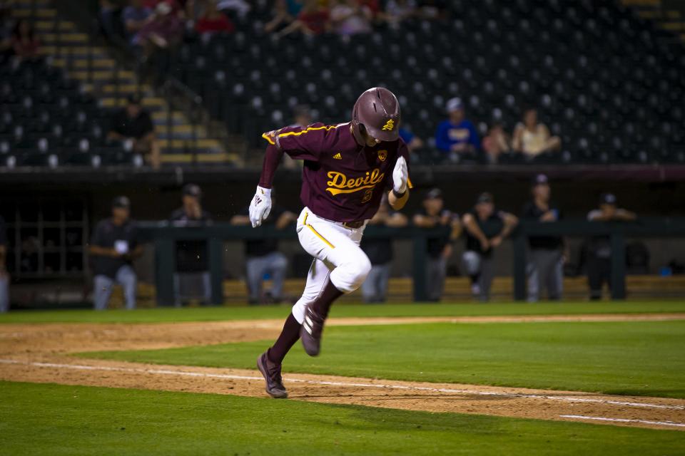 ASU's Joe Lampe (5) runs to first base during a home game against UNLV held at Phoenix Municipal Stadium on Apr. 26, 2022.