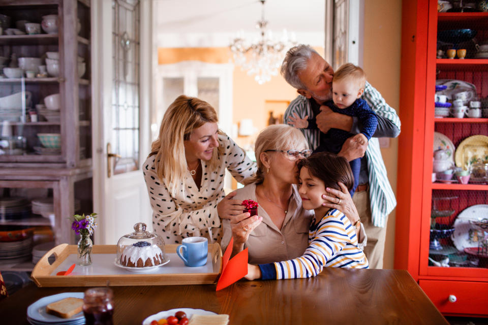 Close up of a multi-generational family celebrating together.