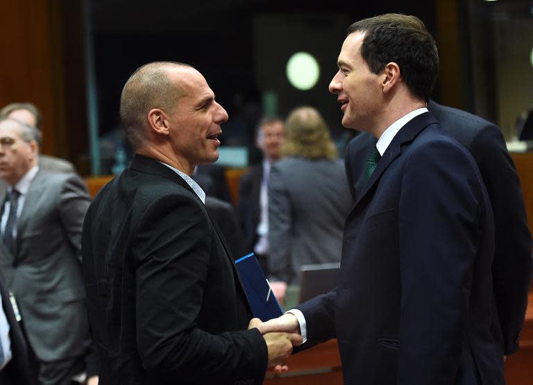 Greek Finance Minister Yanis Varoufakis (L) with his British counterpart George Osborne on May 12, 2015 during an Economic and Financial Affairs Council meeting in Brussels