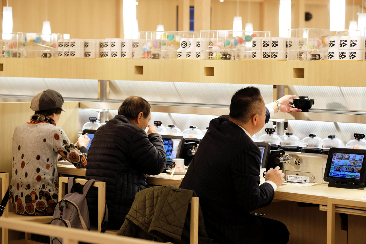 Customers dine at a conveyor belt sushi restaurant chain in Tokyo.  (Kazuhiro Nogi / AFP via Getty Images file)