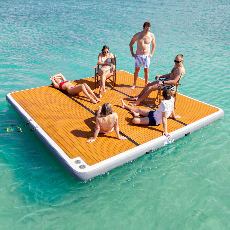 Models on inflatable pontoon