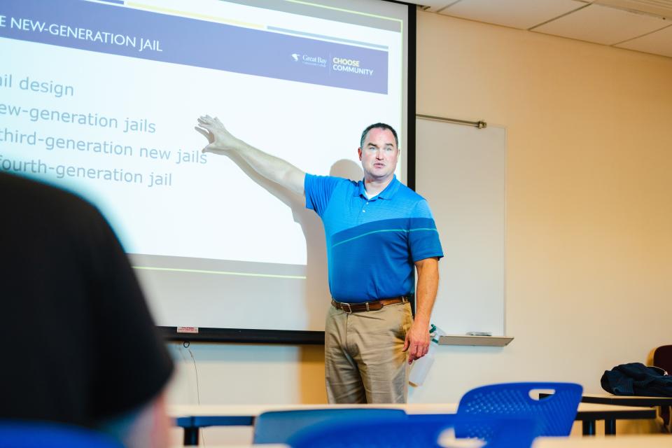Eric Kulberg, department chair and professor, Criminal Justice and Homeland Security program, in class at Great Bay Community College.
